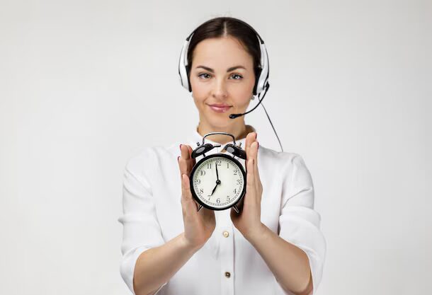 Call center agent holding clock to show time