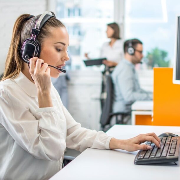 call center agent at desk with headset