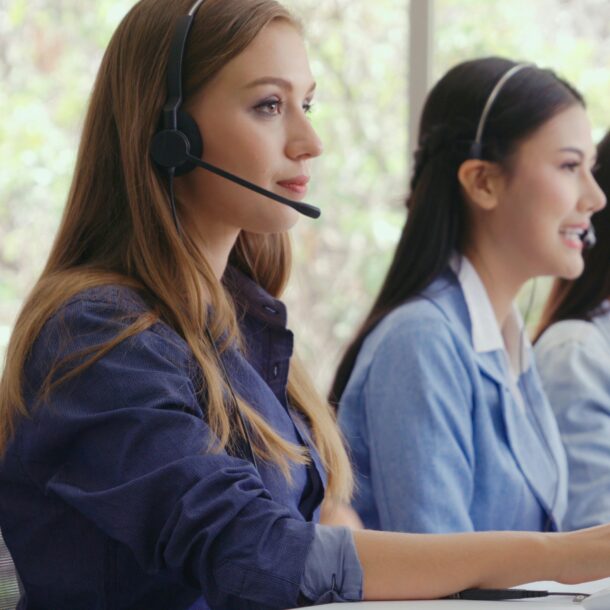 offense bdc agents with head sets at desk