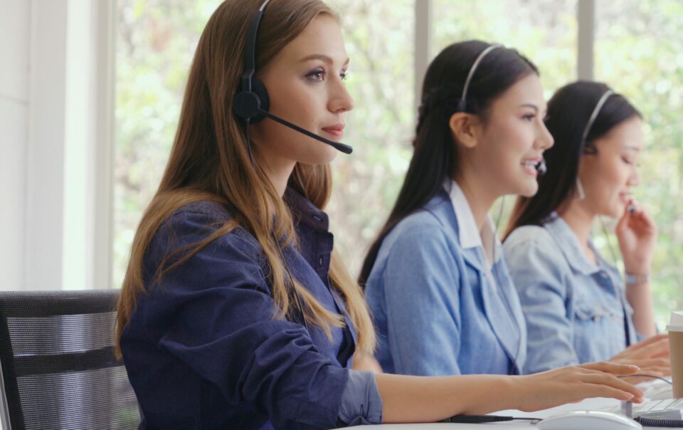 offense bdc agents with head sets at desk
